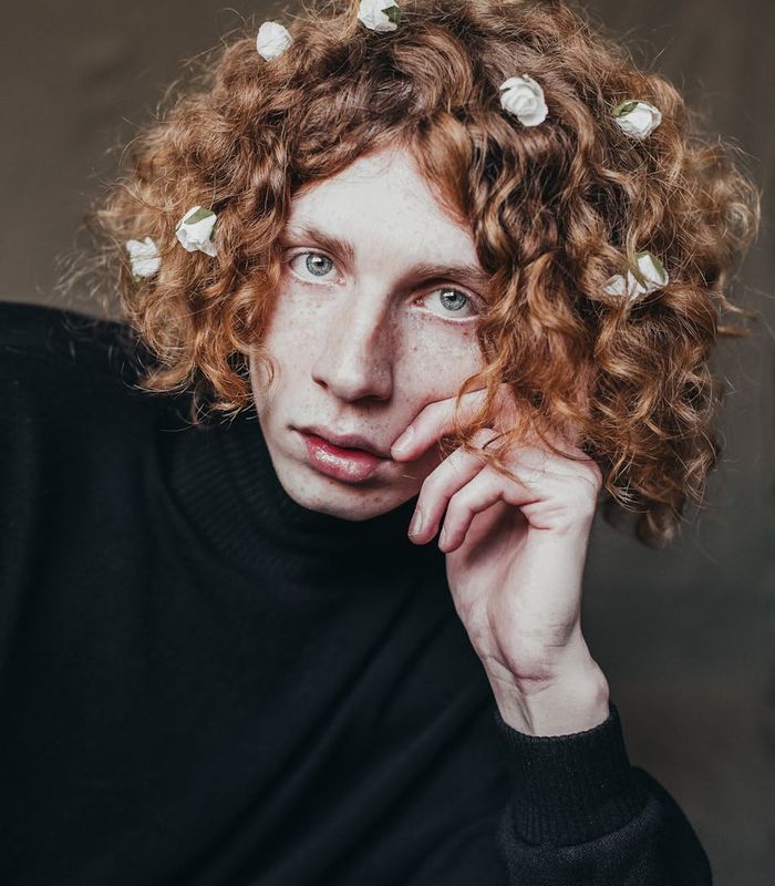 Person looking at the sunset with relaxed eyes